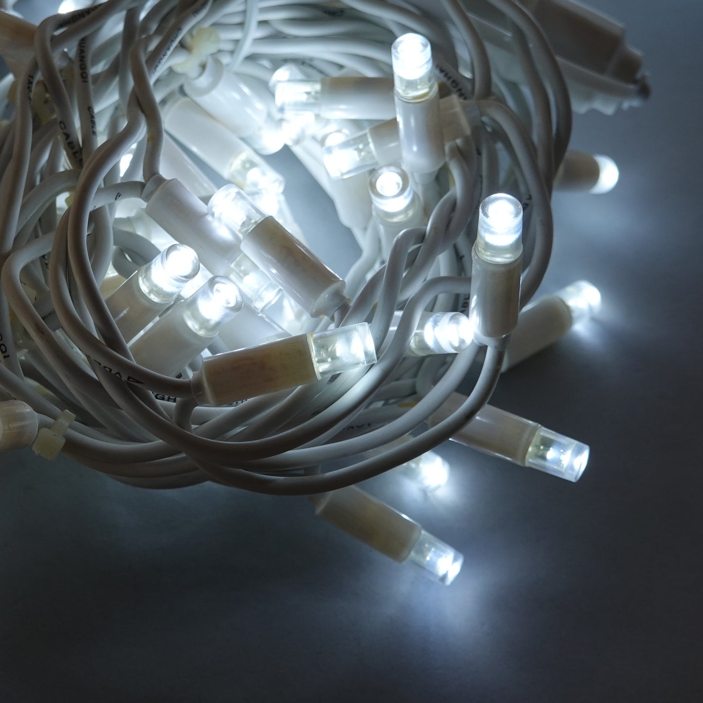 24V 8m micro light strings, warm white 3000K LEDs, with cold white 7000K flash, transparent cable