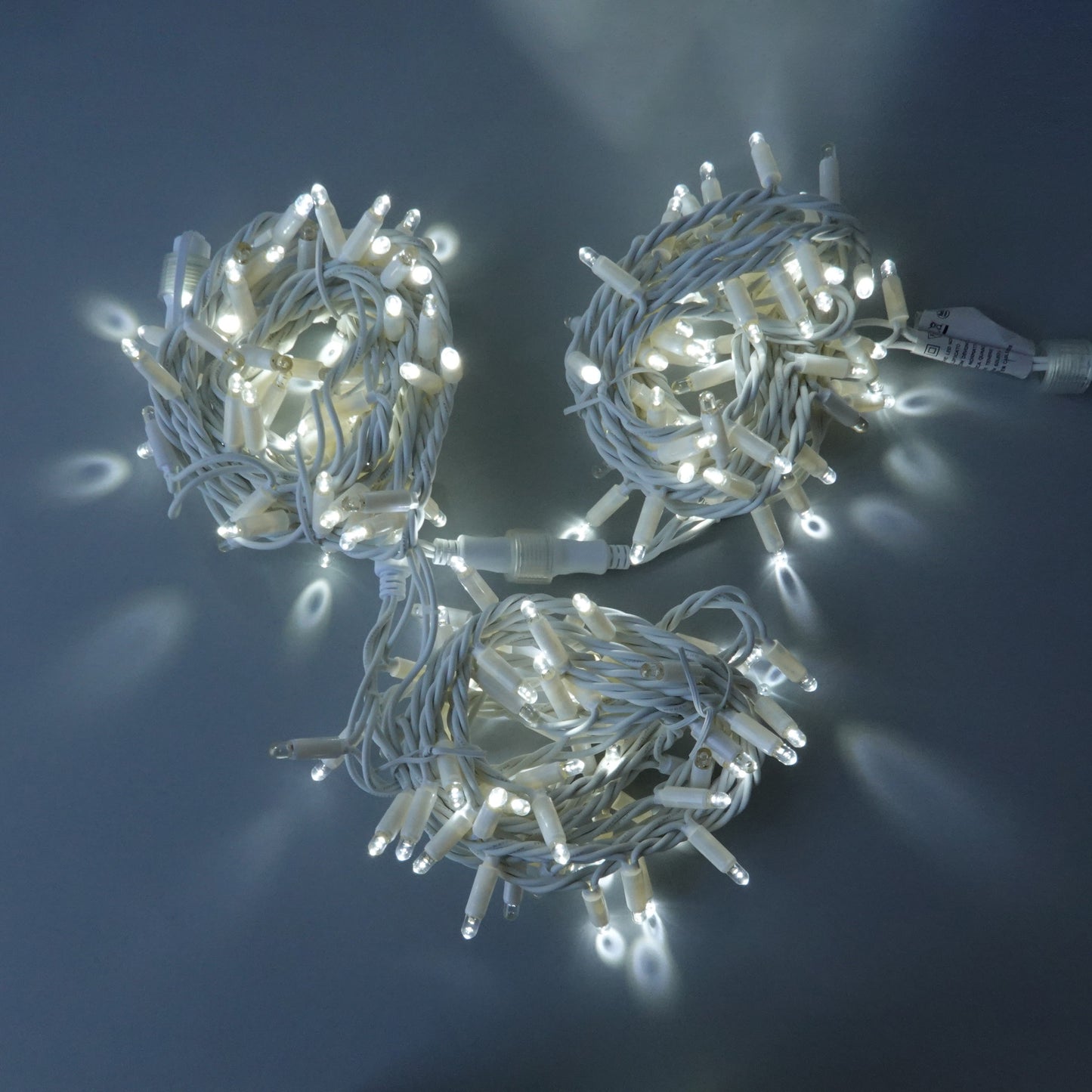 230V 12m (3x4m) micro light strings with 180 auto-flash LEDs and white cable