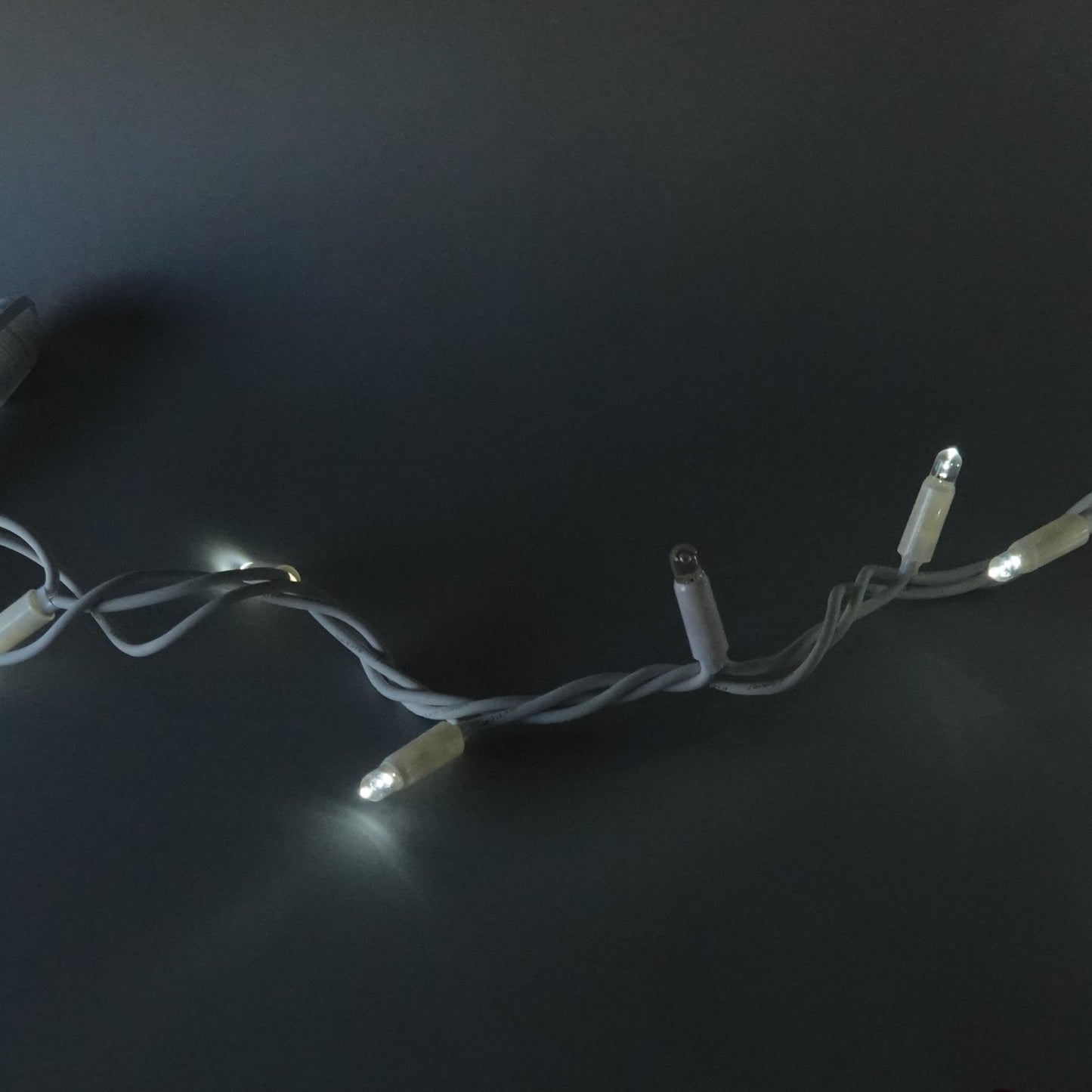 230V 12m (3x4m) micro light strings with 180 auto-flash LEDs and white cable