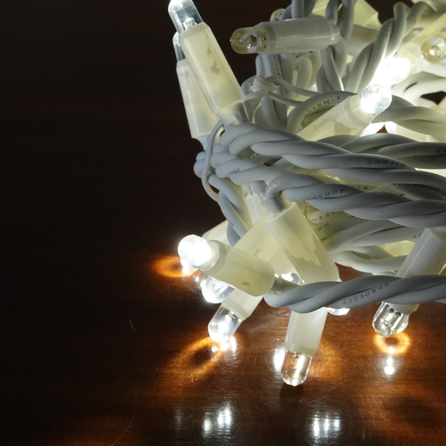 230V 12m (3x4m) micro light strings with 180 auto-flash LEDs and white cable