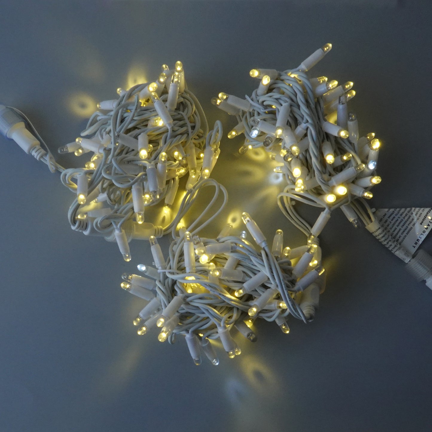 230V 12m (3x4m) micro light strings with 180 auto-flash LEDs and white cable