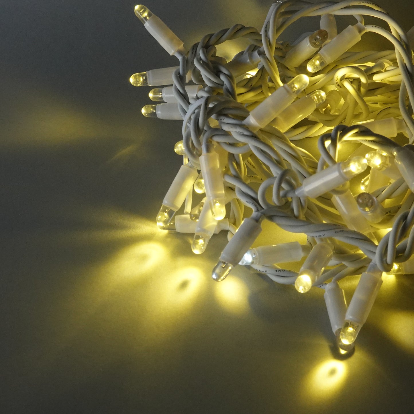 230V 12m (3x4m) micro light strings with 180 auto-flash LEDs and white cable