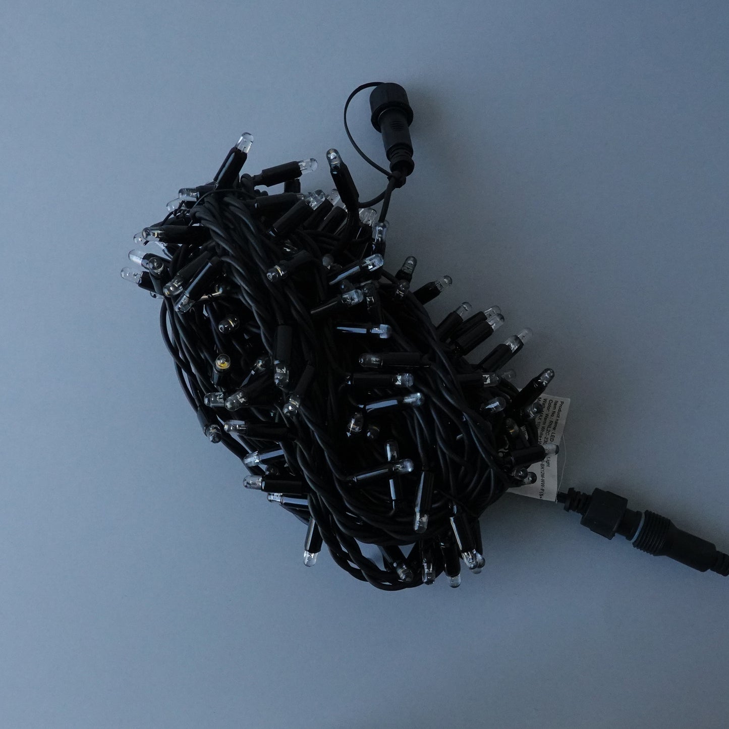 230V 8m micro light strings, warm white 3000K LEDs, with cold white 7000K flash, black cable