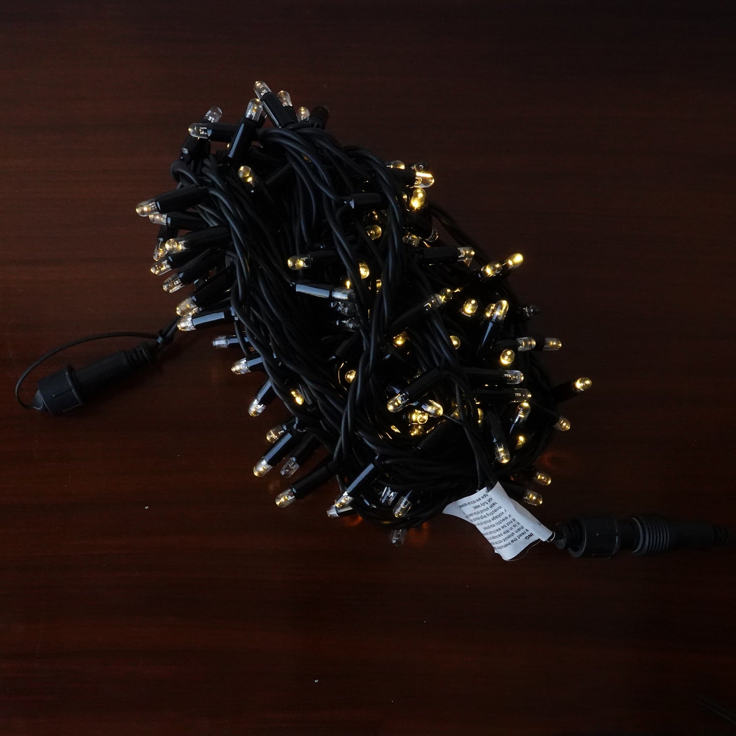 230V 8m micro light strings, warm white 3000K LEDs, with cold white 7000K flash, black cable