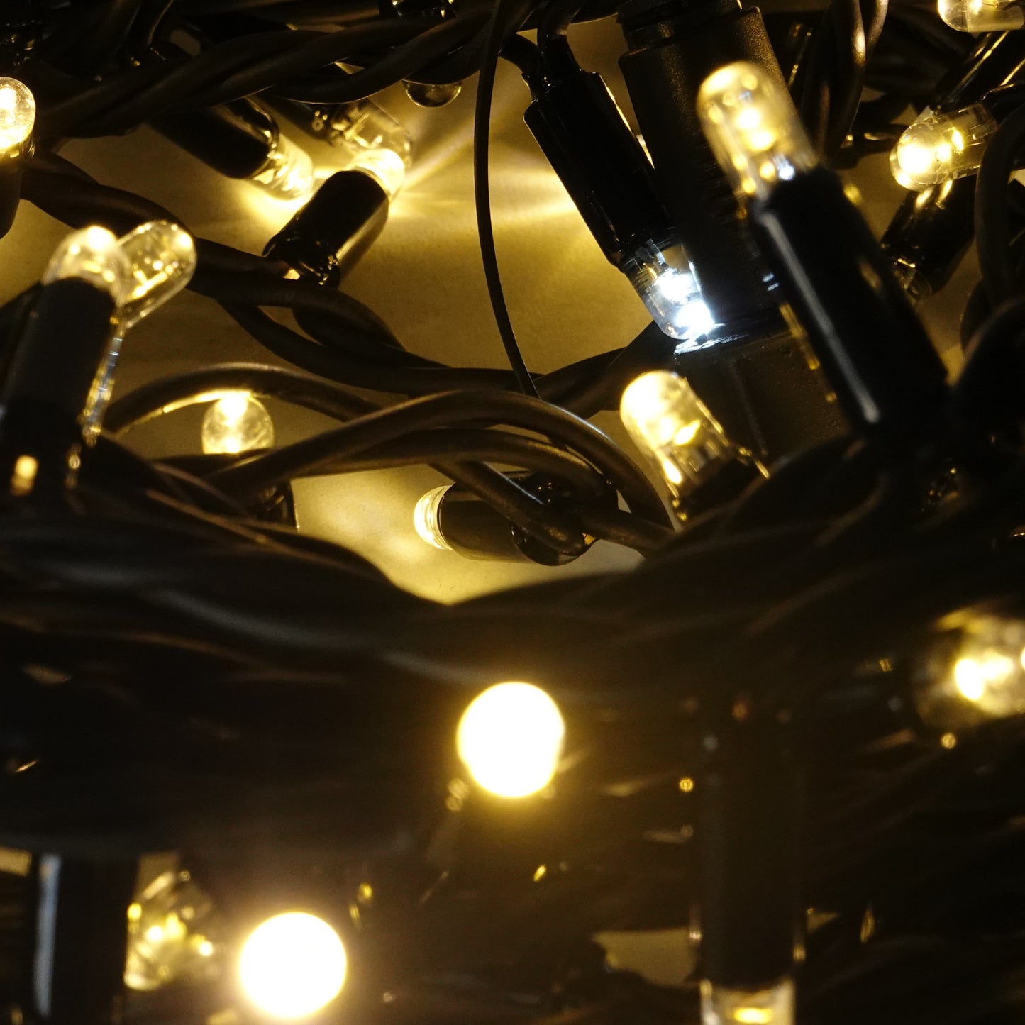 230V 8m micro light strings, warm white 3000K LEDs, with cold white 7000K flash, black cable